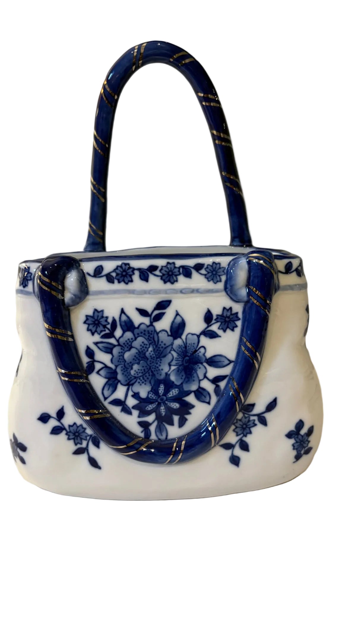 Other side of blue-and-white floral decorative basket with curved handle