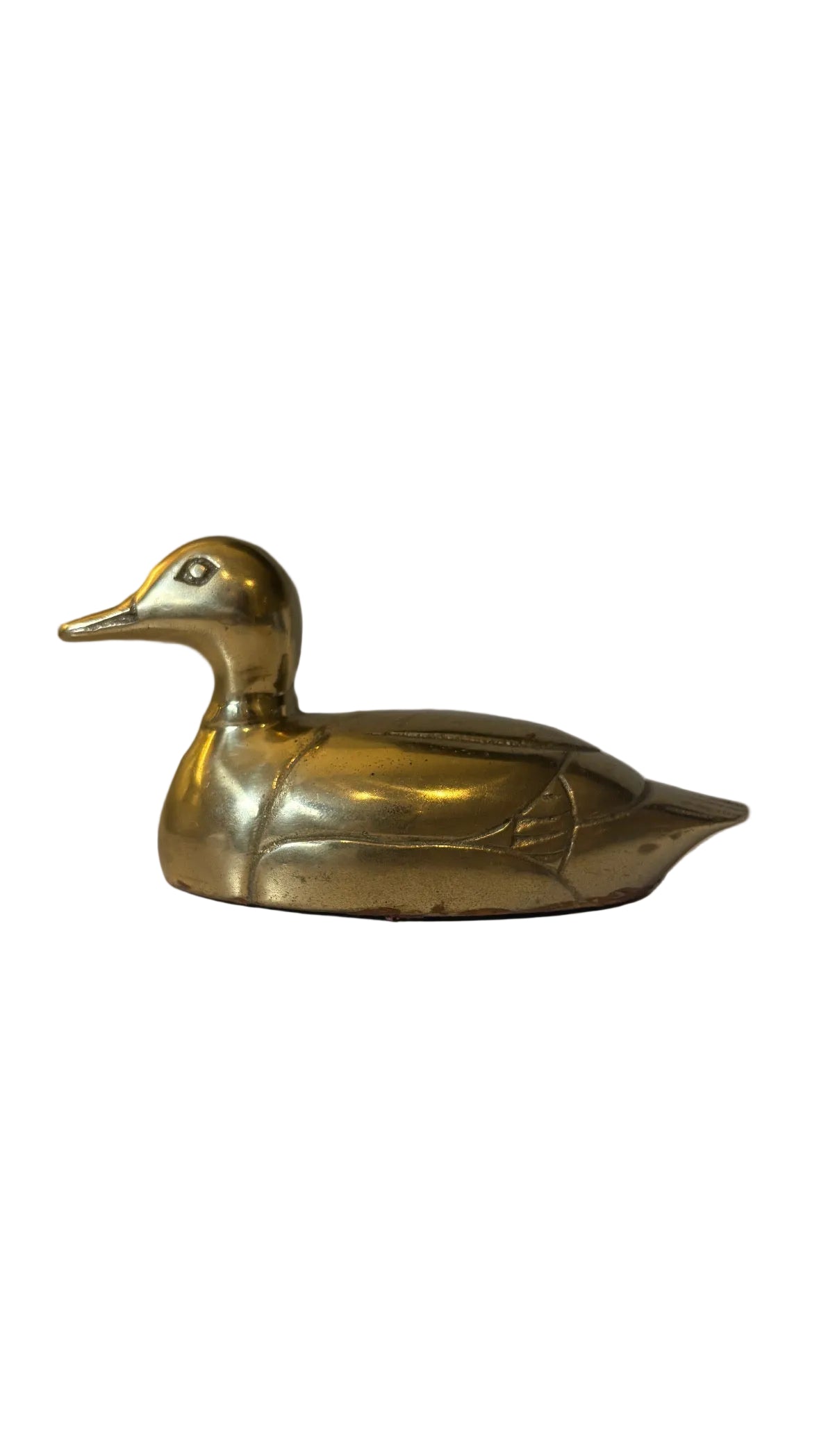 Side view of brass-tone duck figurine