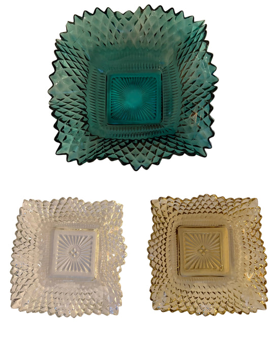 Set of 3 vintage diamond-cut pressed glass dishes in teal, clear, and amber