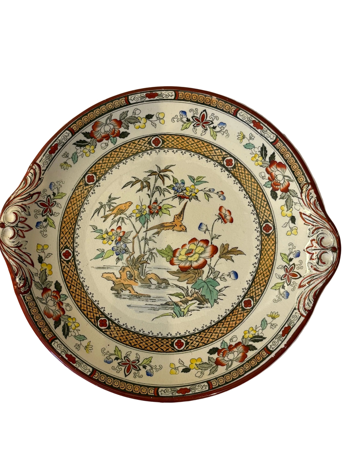 Back of floral bird plate with Hong Kong and maker's marks