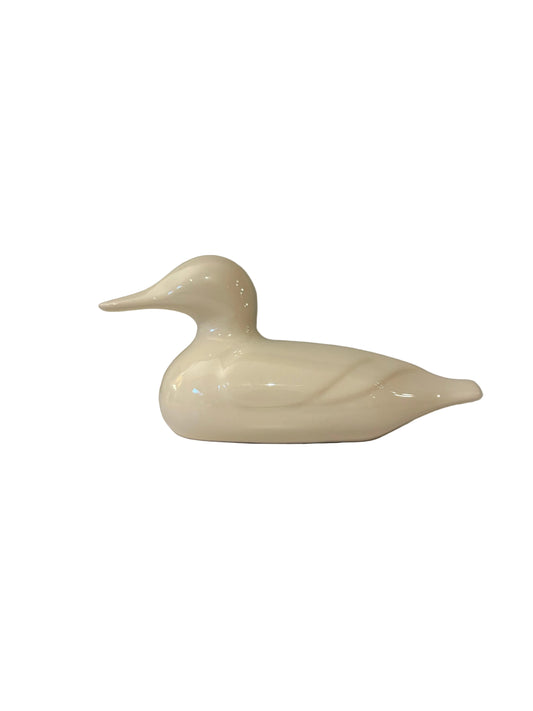 White duck figurine with glossy finish and sculpted wing details